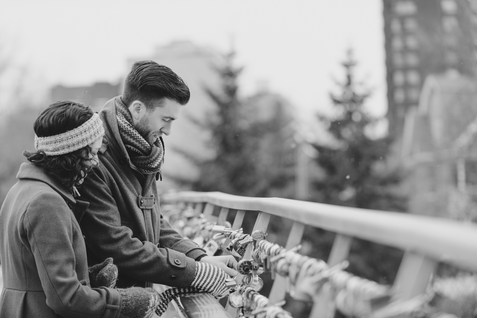 Love lock bridge engagement photo session in Ottawa