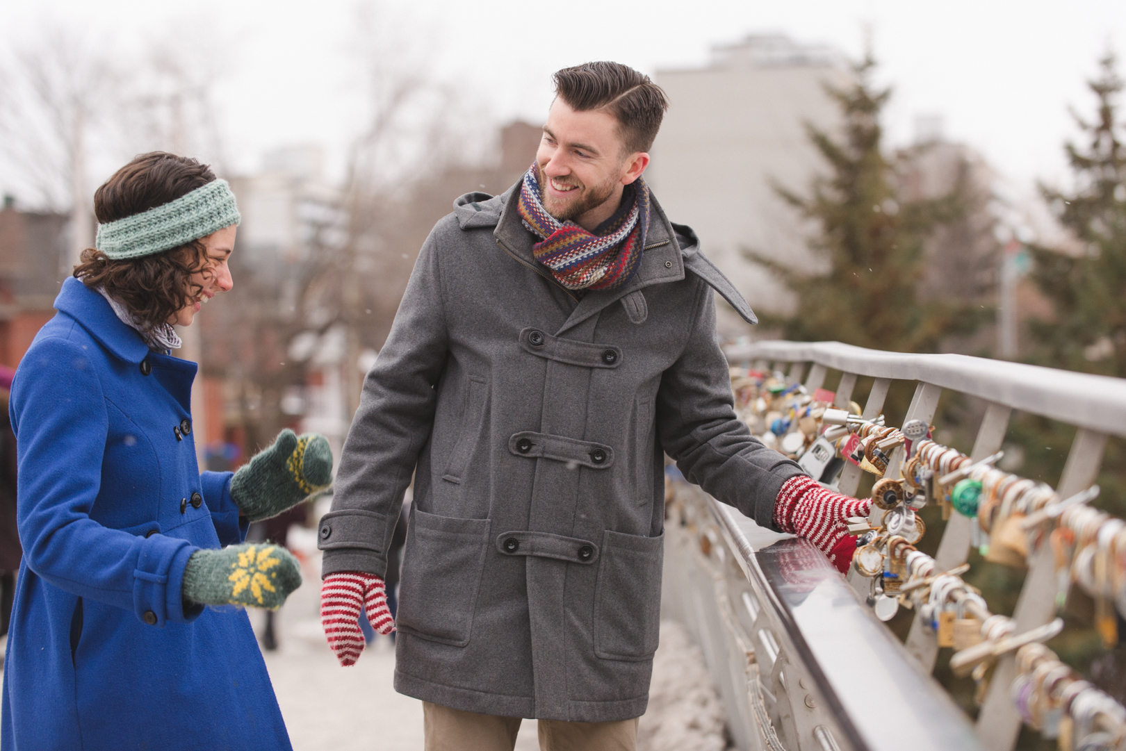 Love lock bridge engagement photo session in Ottawa