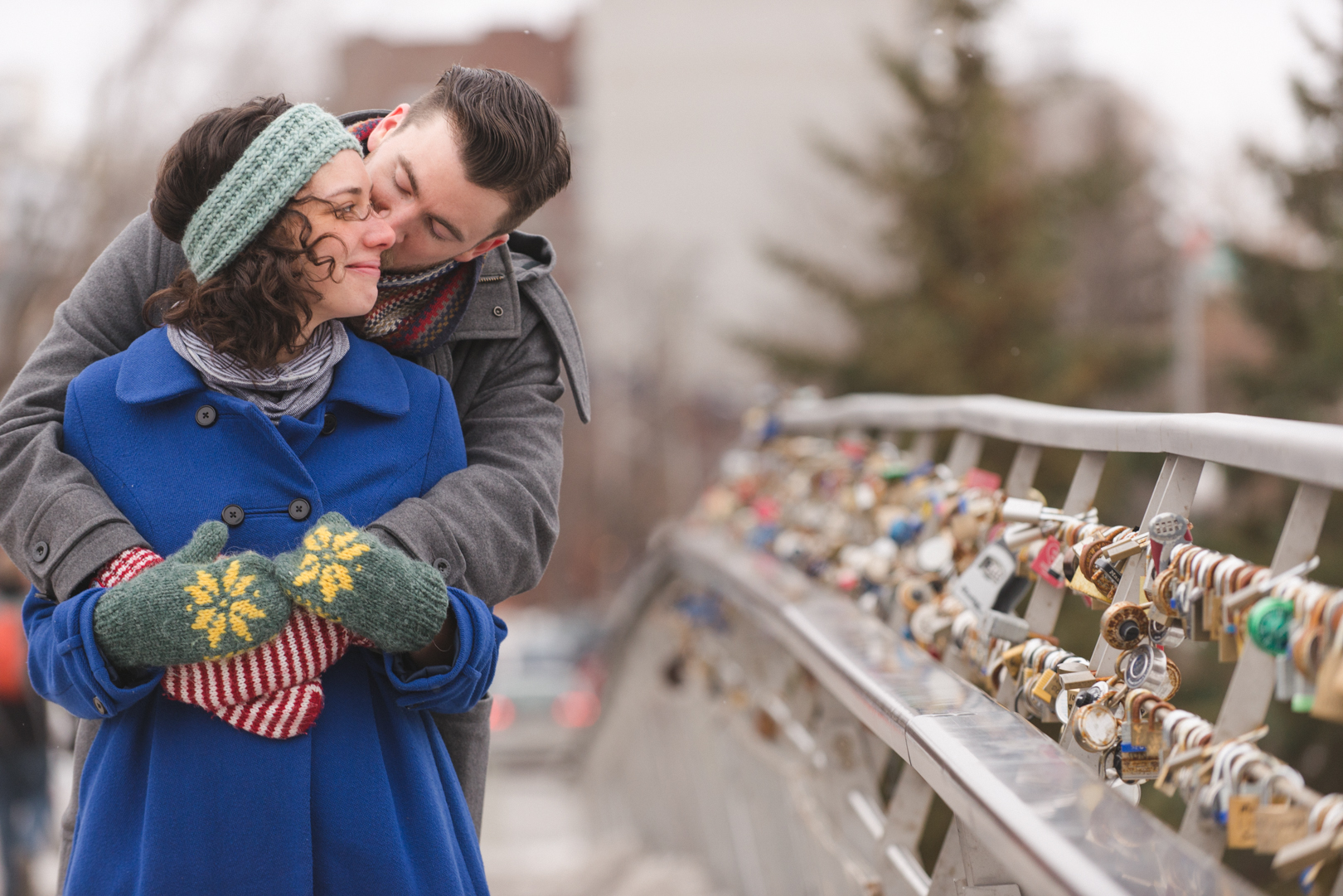 Love lock bridge engagement photo session in Ottawa