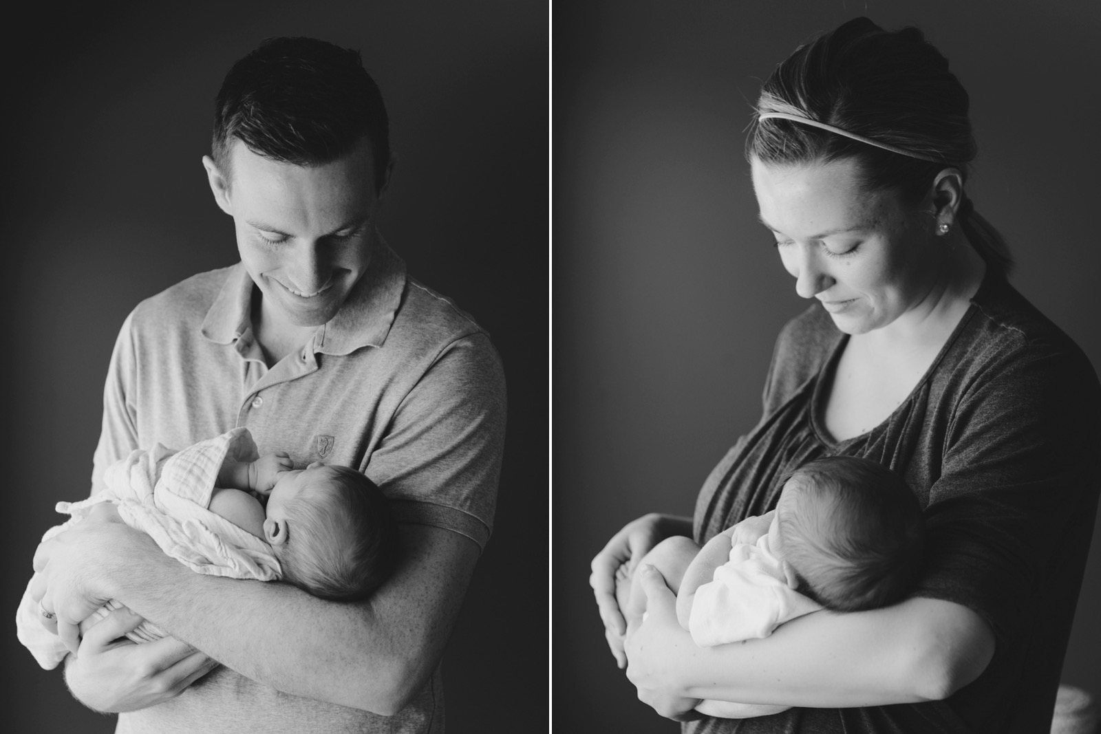 newborn parents by window light in black and white