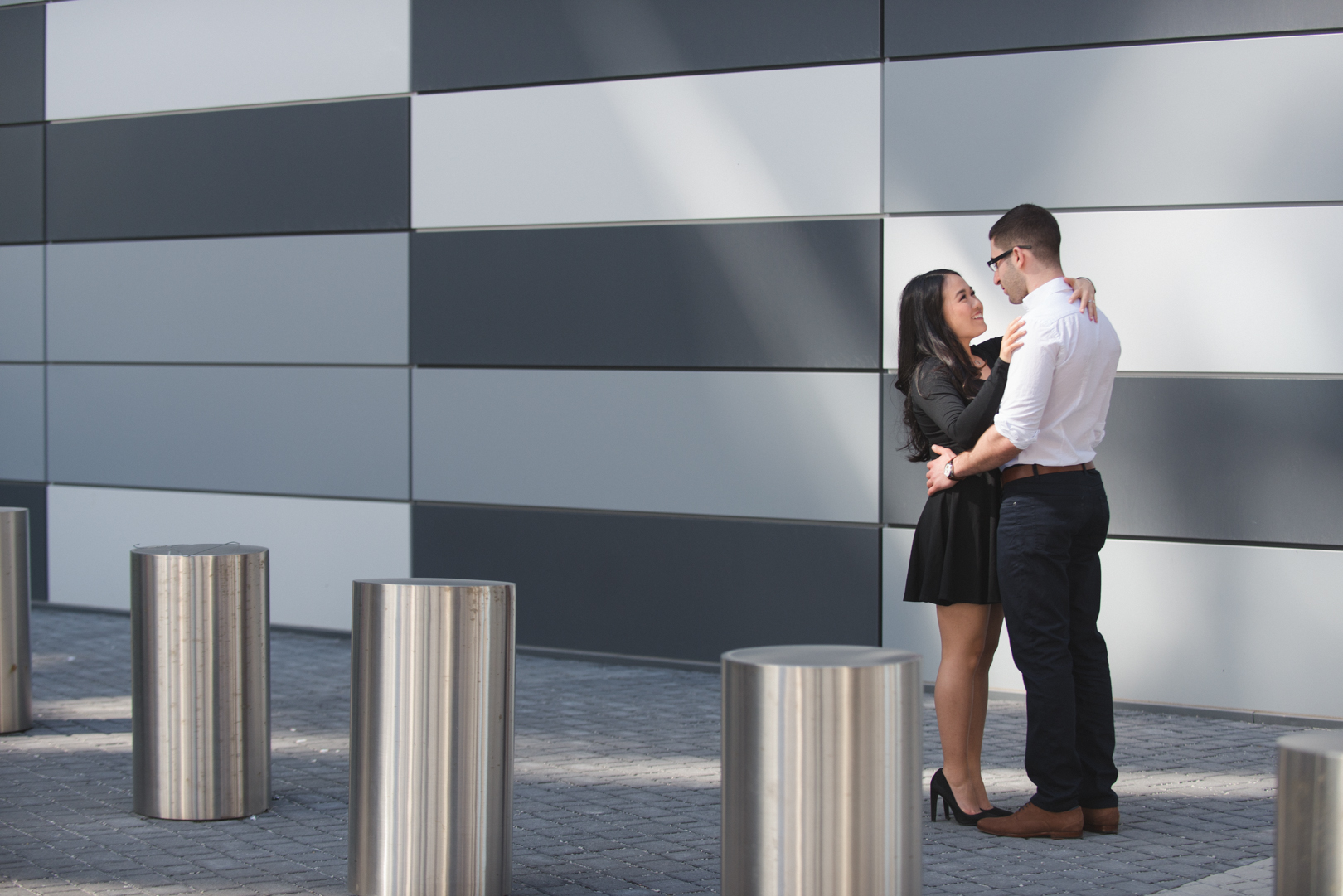 Couple in downtown Toronto underneath Gardiner Expressway