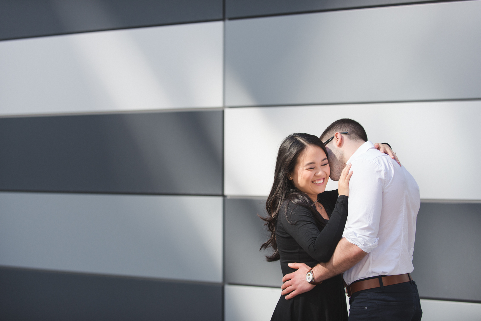 Couple in downtown Toronto underneath Gardiner Expressway