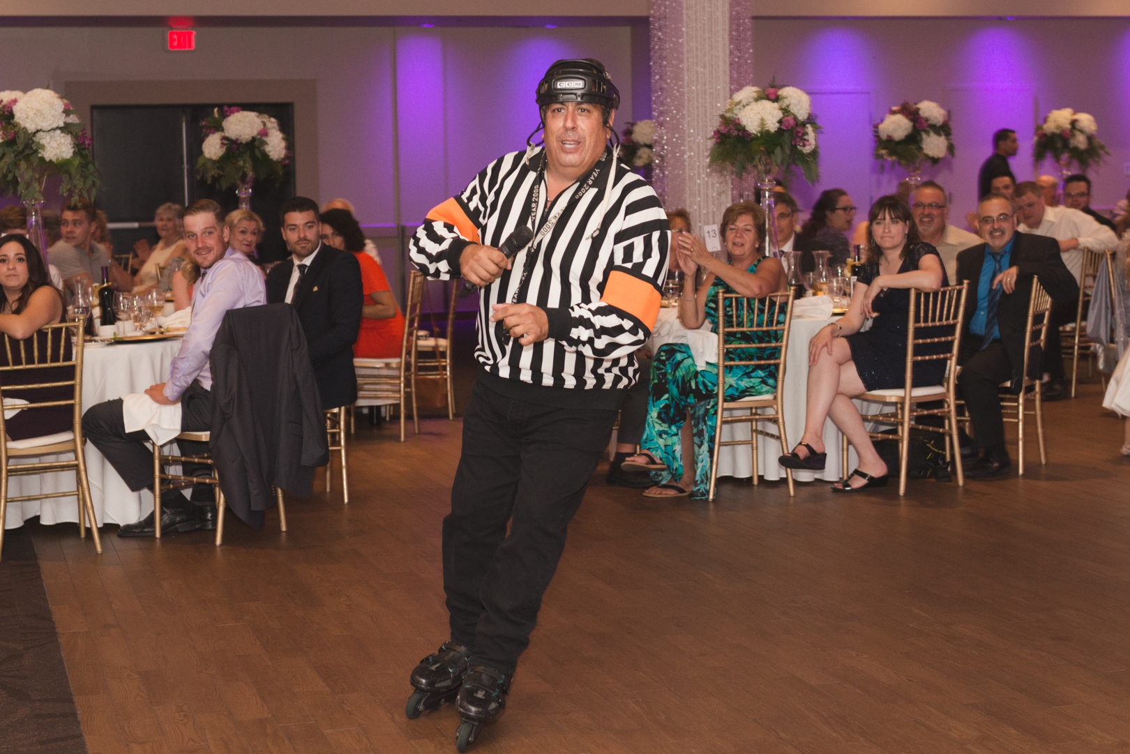 george thomas skating as a referee at wedding reception