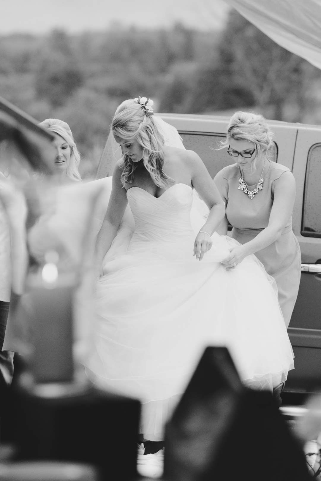 bride getting out of pickup truck before ceremony