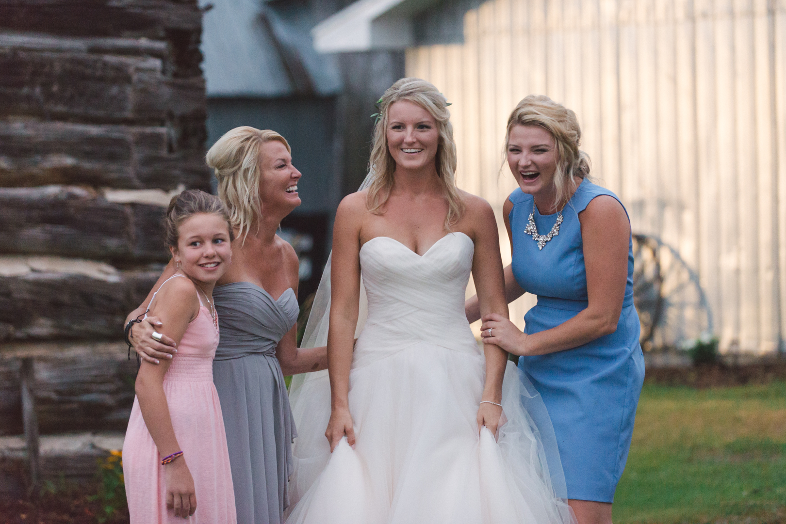 bride and her bridesmaids at the farm