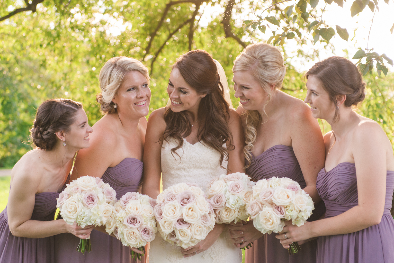 bride and bridesmaids giggling