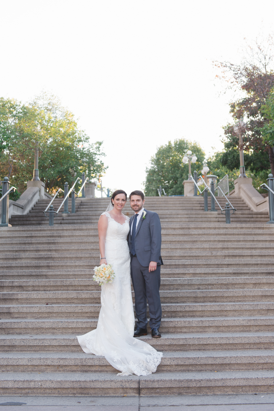 bride and groom on staircase in byward market