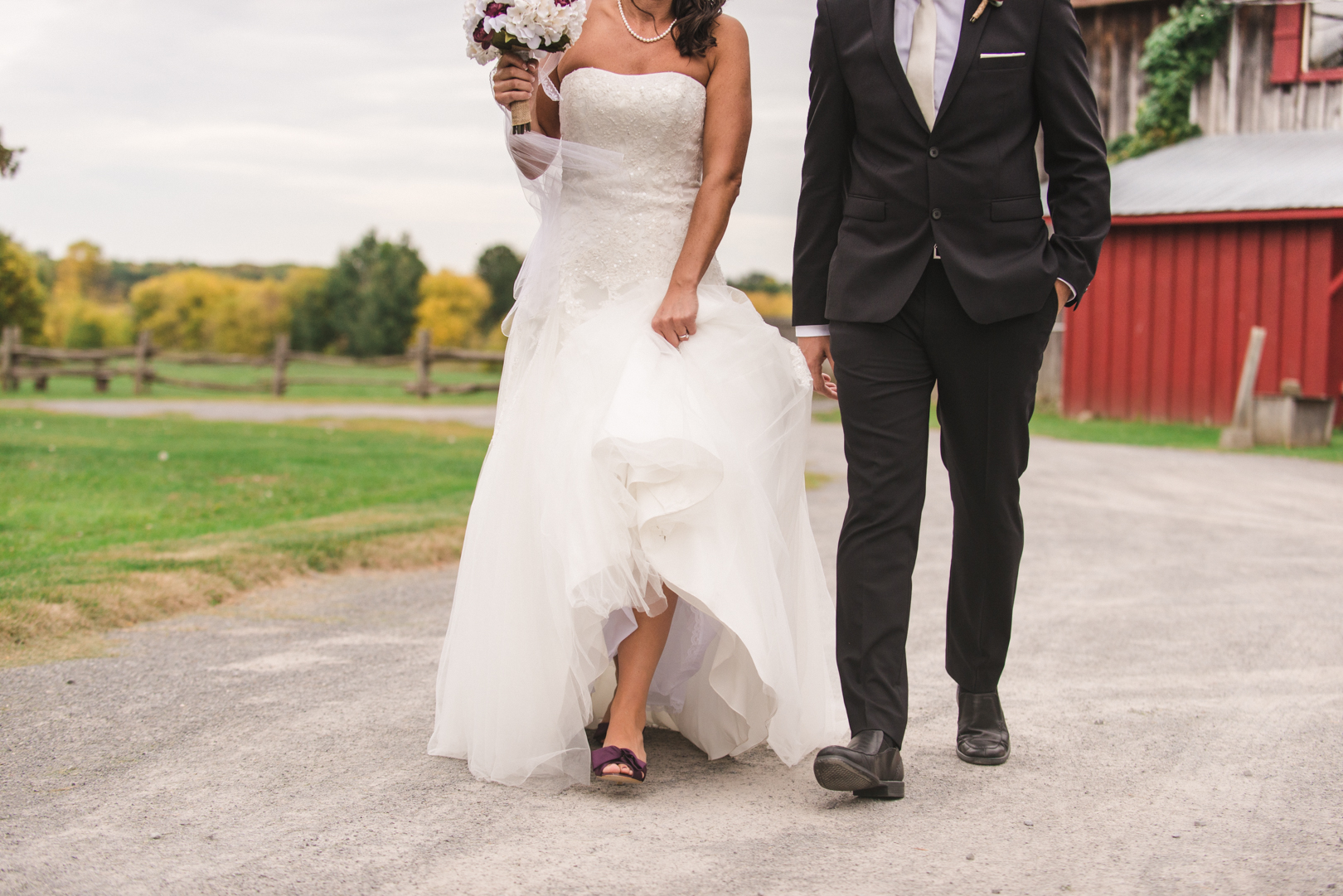 bride and groom walking the grounds of strathmere in ottawa