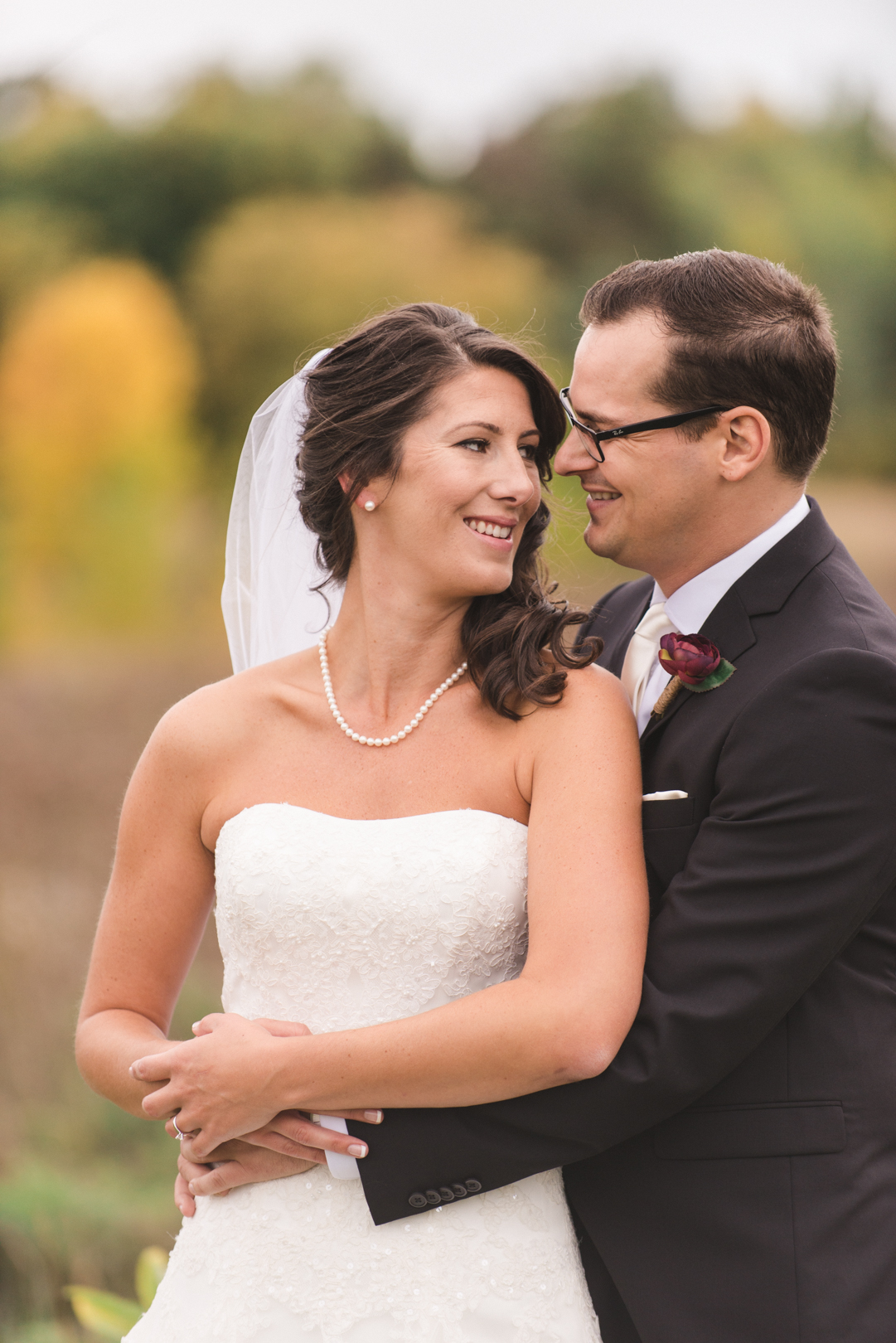 bride and groom cuddling at strathmere in ottawa