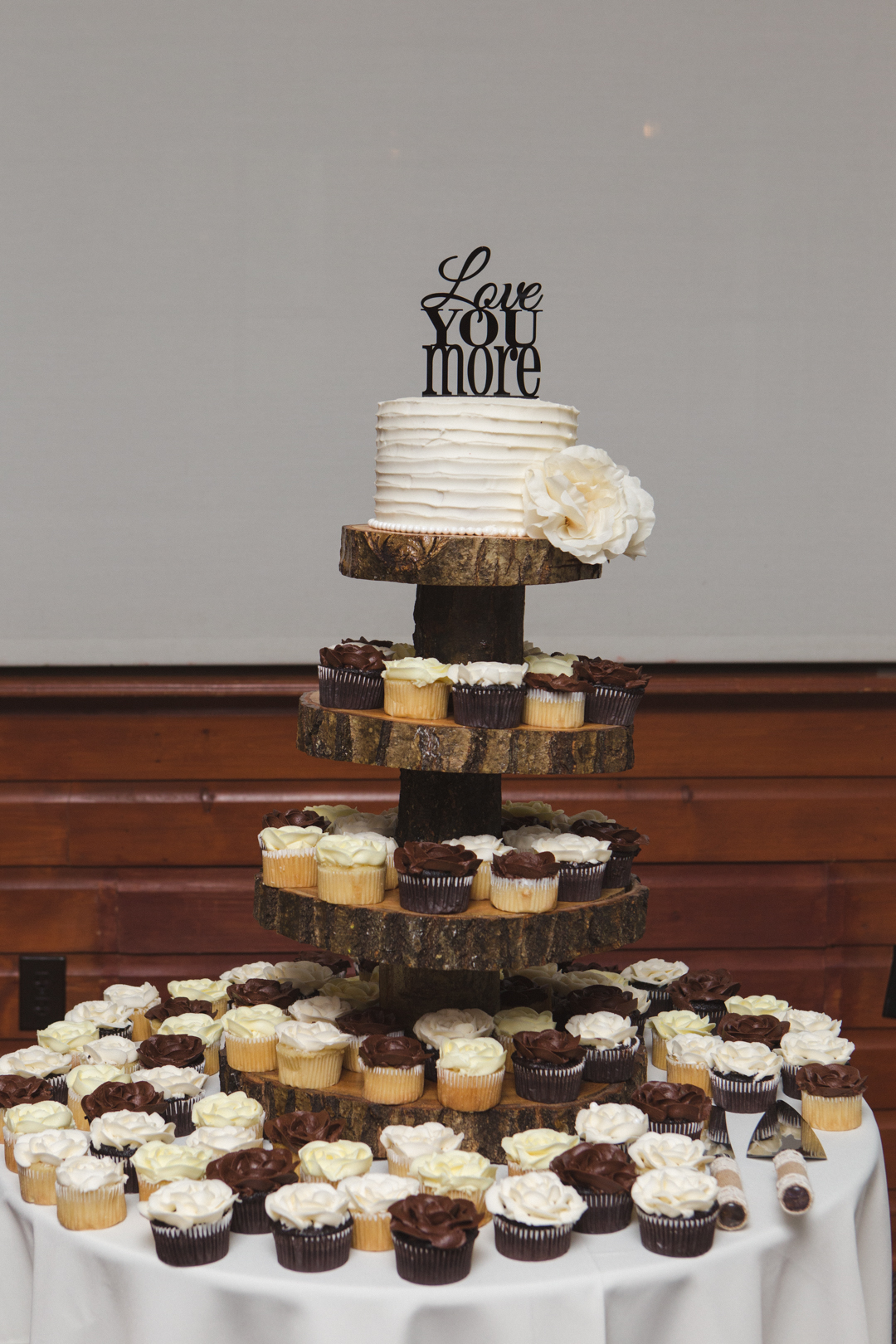 wedding cupcake tower on tree rounds