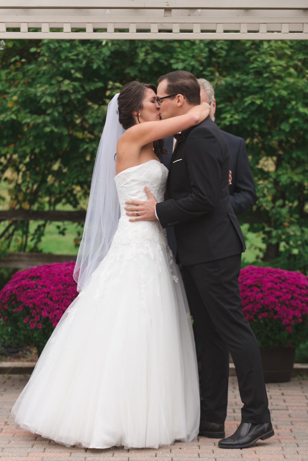 first kiss at garden house wedding ceremony at strathmere