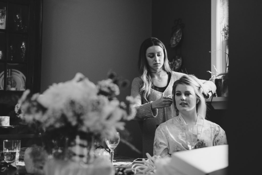 bridesmaid getting her hair done