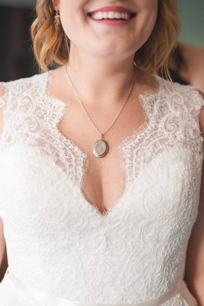 bride's locket around her neck