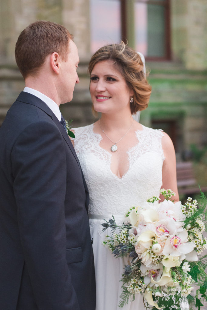 bride and groom outside the museum of nature in ottawa