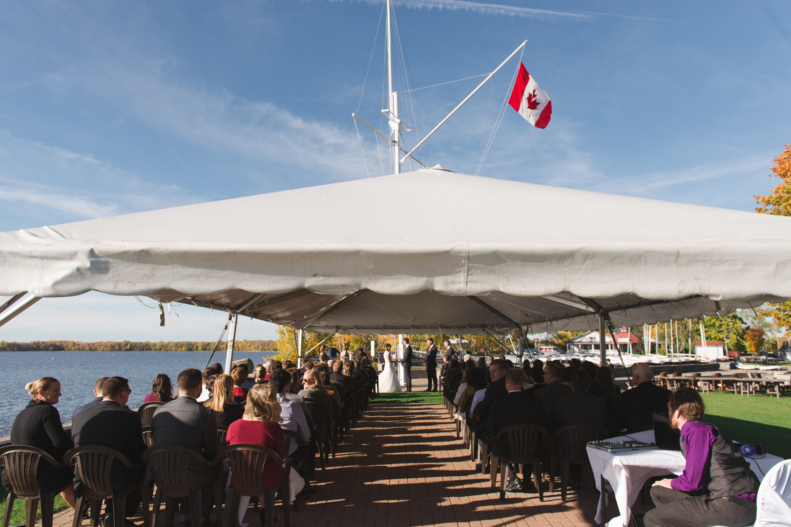 Wedding ceremony at Britannia Yacht Club under the tent