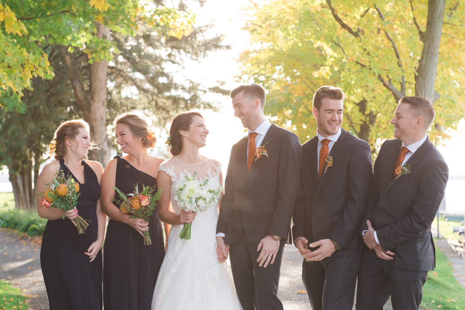 Wedding party laughing together