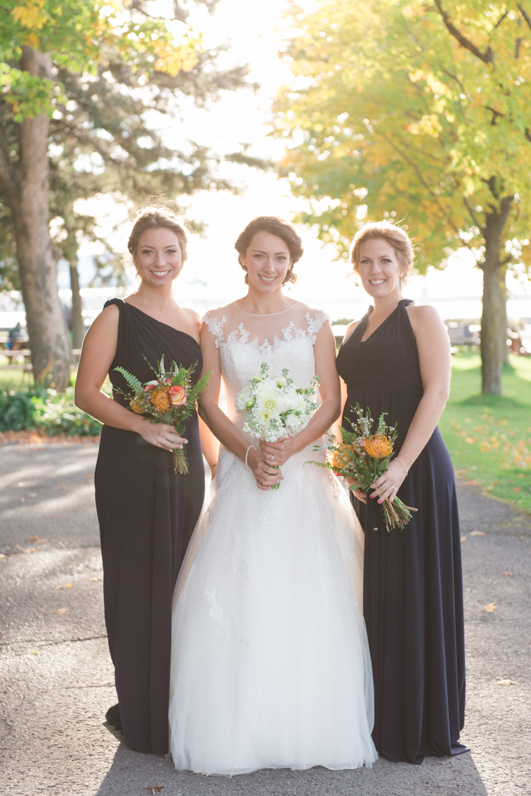 bride and bridesmaids holding pollen nation bouquets