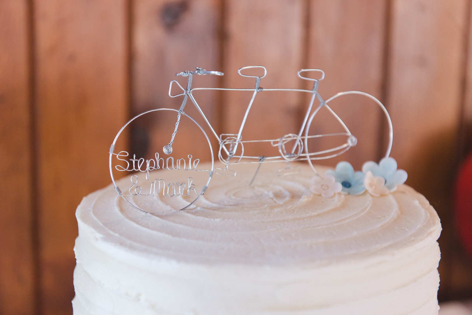 Wedding cake with bicycle on top