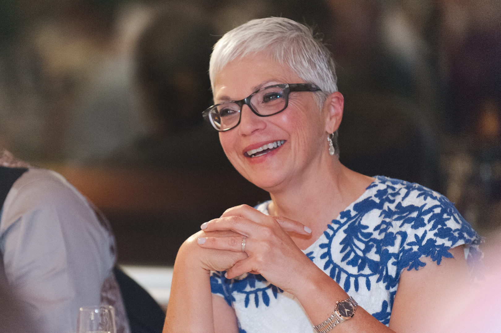 mother of the bride laughing at speeches