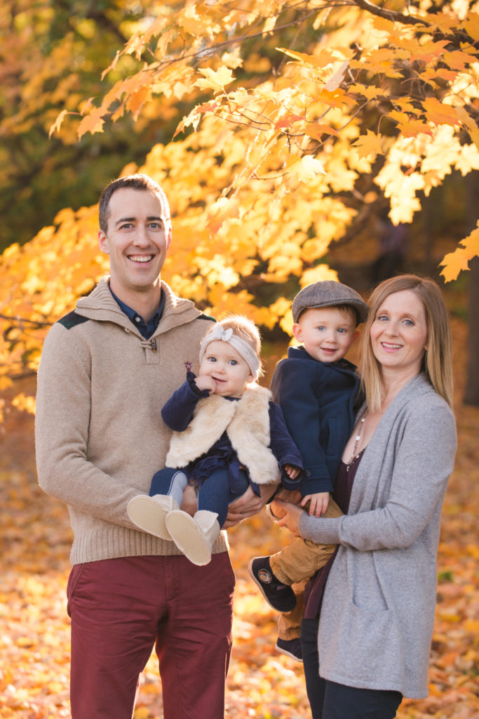 Parents and children at the ottawa arboretum on a fall day