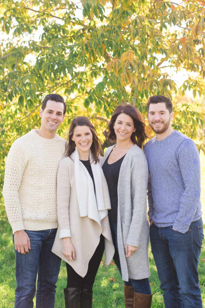 photo of siblings on a sunny fall day at the arboretum