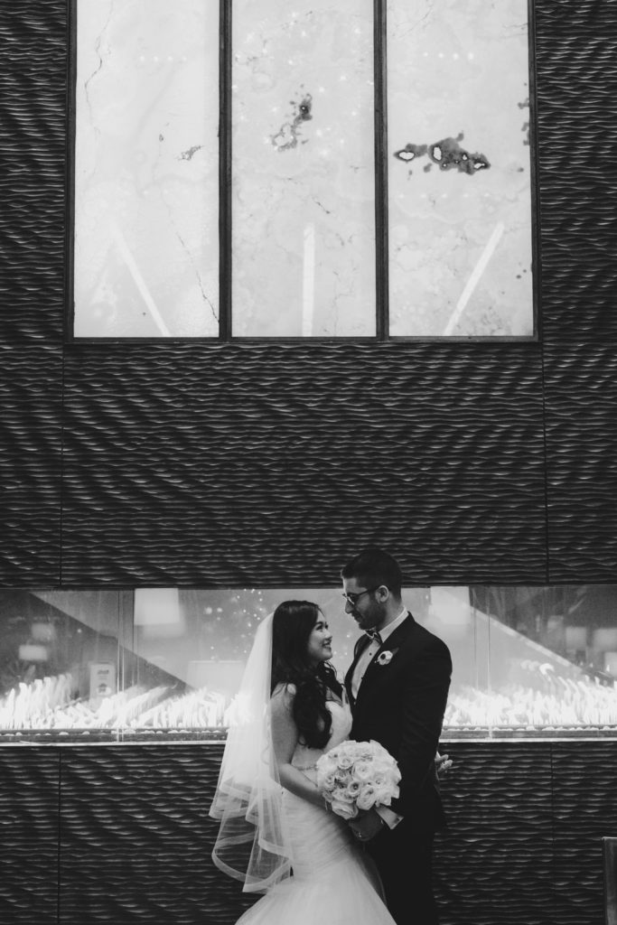 Bride and Groom by the fire at the Westin hotel in Ottawa