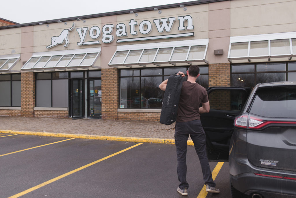 police officer arriving to yogatown to practice yoga