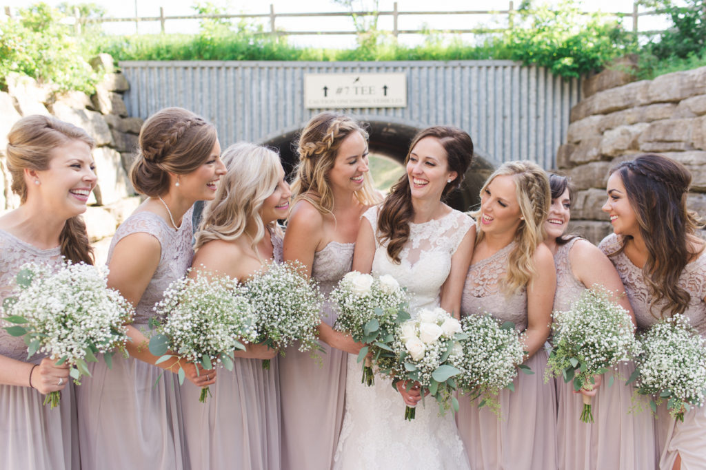 bridesmaids laughing together in lavender