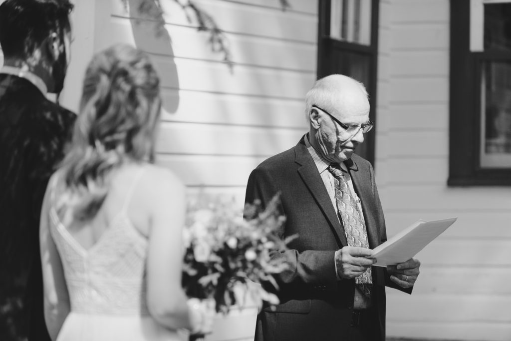 wedding officiant reading during wedding ceremony