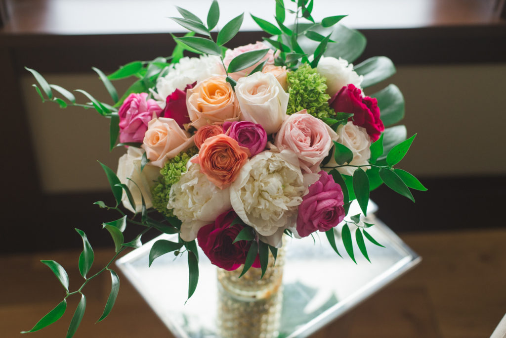 cambodian inspired floral bouquet with palm leaf