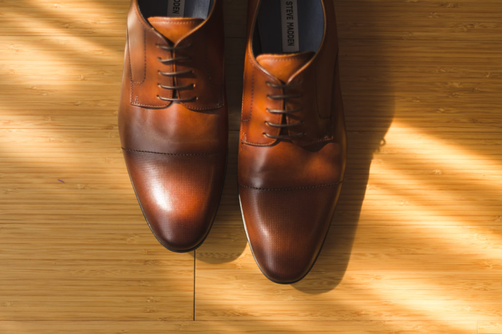 groom's shoes in shadows