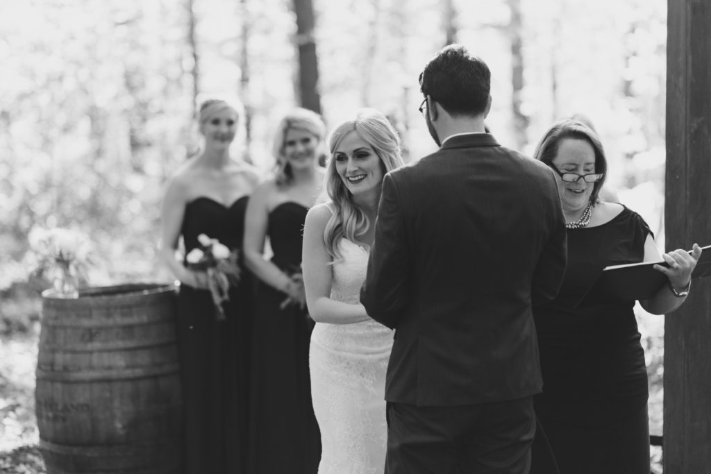 bride laughing during ceremony