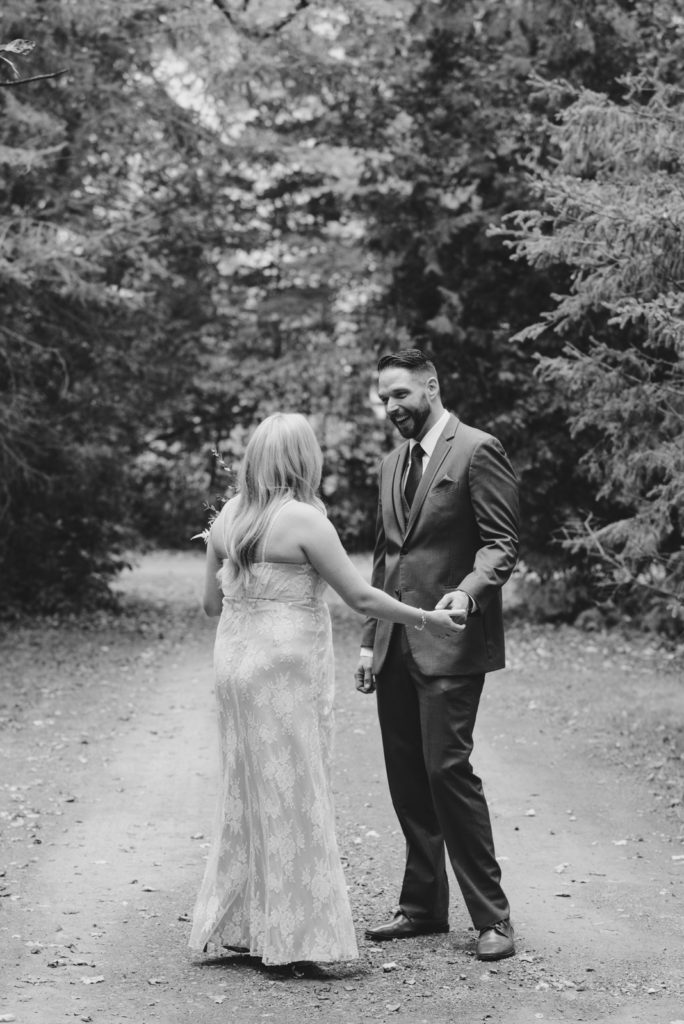 Groom seeing bride for the first time during first look