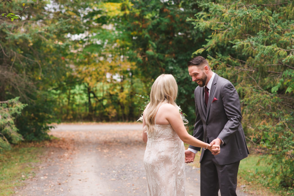 Groom's first look reaction