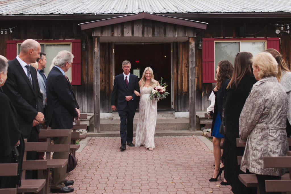 bride and her dad walking down the aisle at the Lodge Strathmere