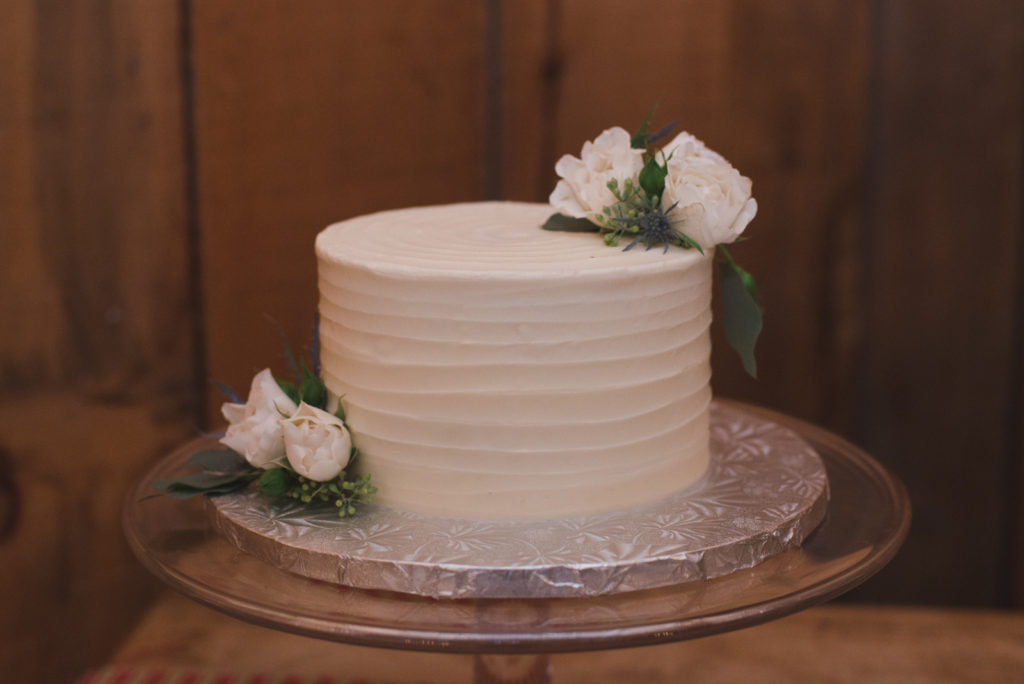 white wedding cake with flowers