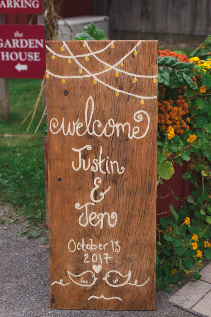 welcome wedding sign on wooden board