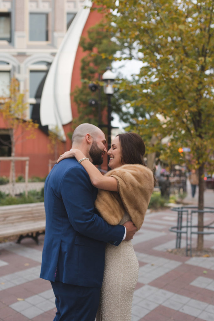 vintage bride and groom kissing in downtown Toronto