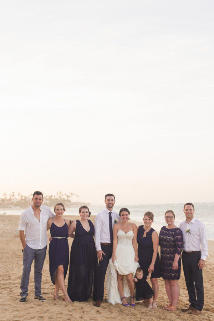 wedding party on the beach at sunset