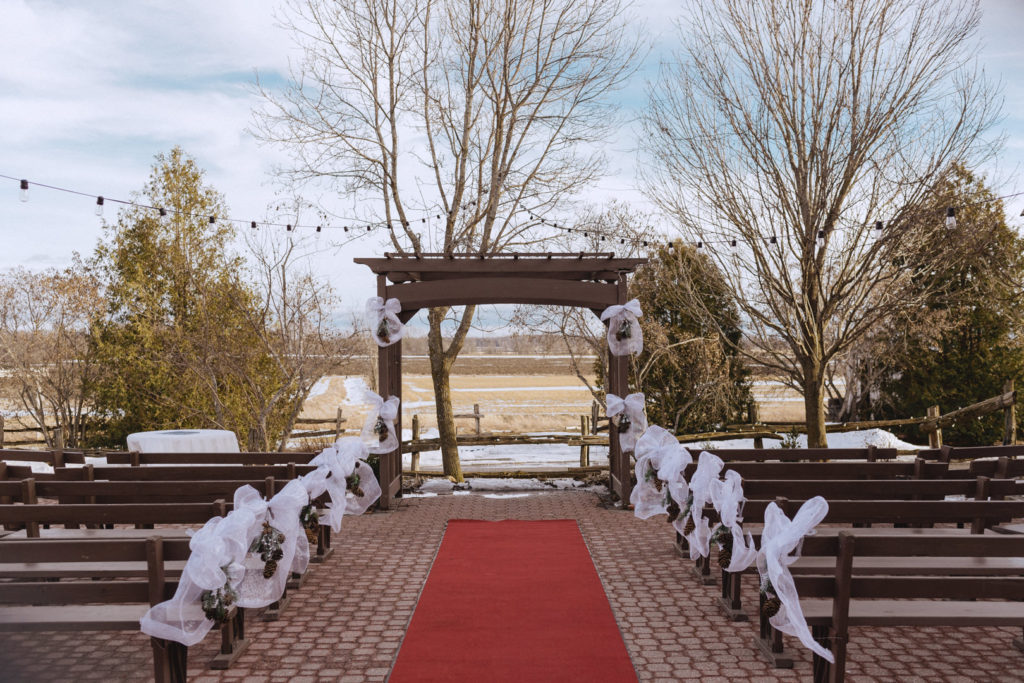 Outdoor ceremony at winter wedding at Strathmere