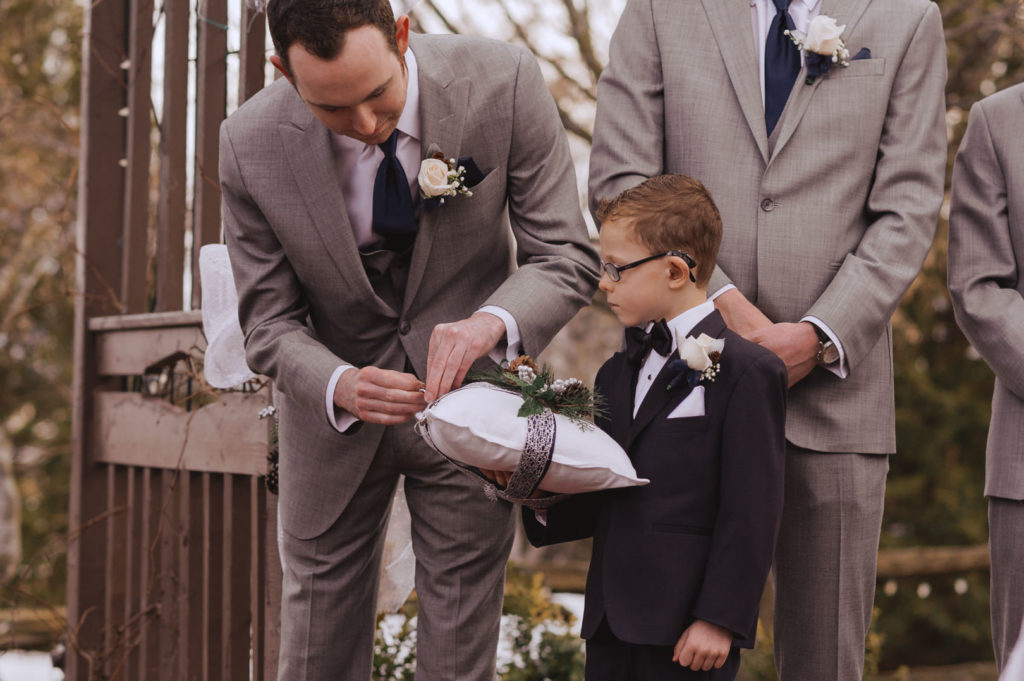 ring bearer delivering rings for the wedding ceremony