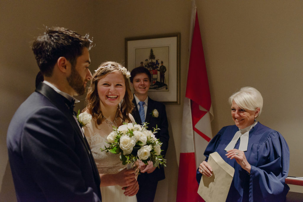 bride and groom laughing after wedding ceremony