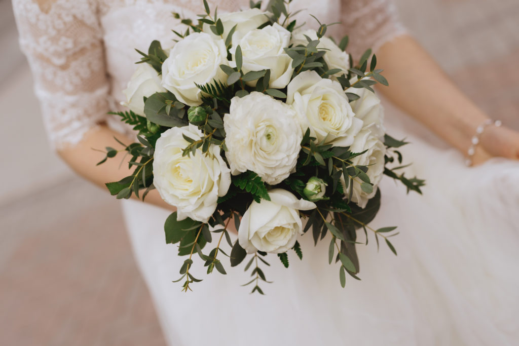 white wild rose bouquet with greenery