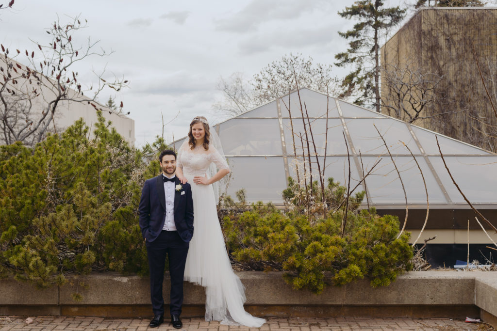 bride and groom on rooftop garden