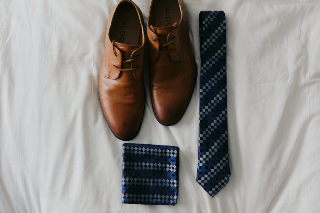 groom's shoes, tie and pocket square
