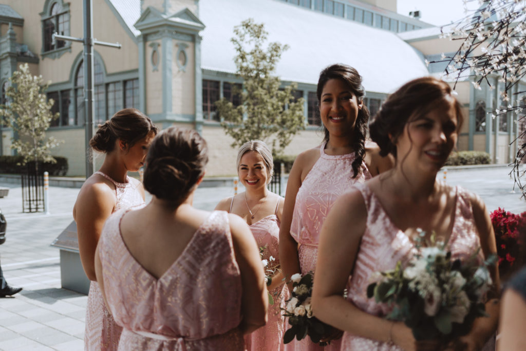 bridesmaids waiting outside the Horticulture Building