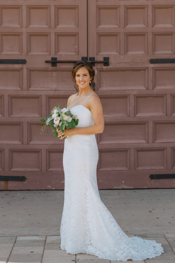 bride standing in front of Aberdeen Pavilion doors