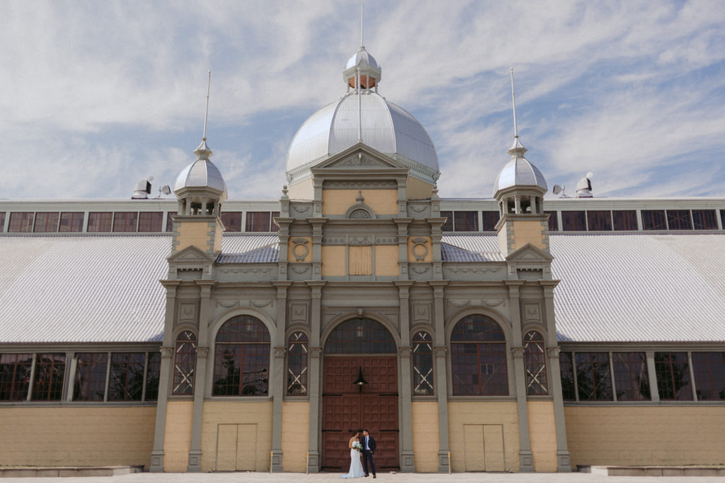 bride and groom in front of the Aberdeen Pavilion