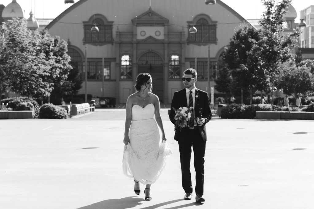 bride and groom walking around Lansdown Park