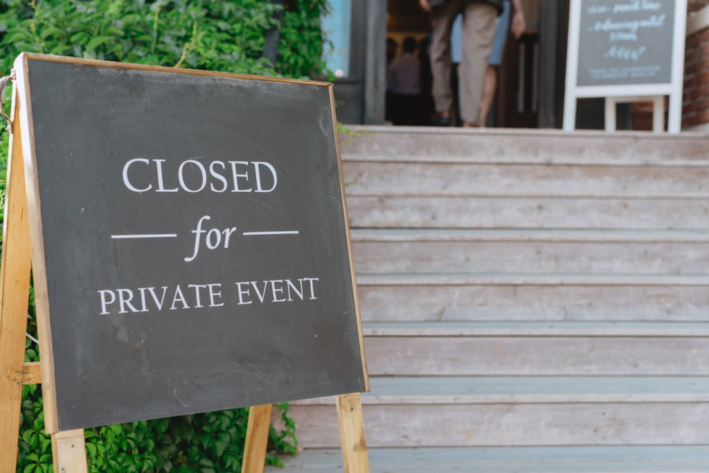 outdoor sign that says "closed for private event"